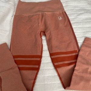 Bombshell sportswear medium large elite leggings, burnt orange